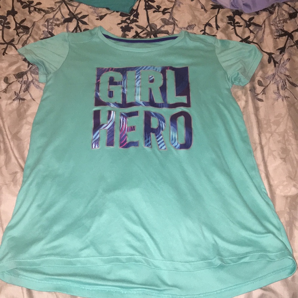 Teal athletic shirt.